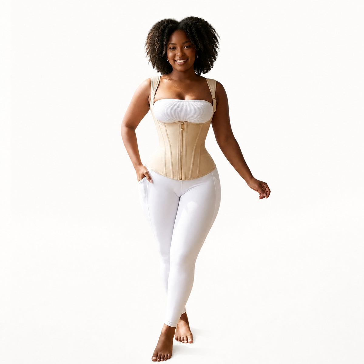 Full-body shot of model in minimalist indoor space wearing waist trainer, showcasing fit, support, and warm indoor ambiance.