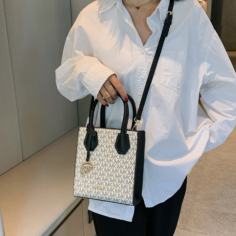 Structured Patterned Tote with Top Handles, Crossbody Strap, and Top Zip Closure