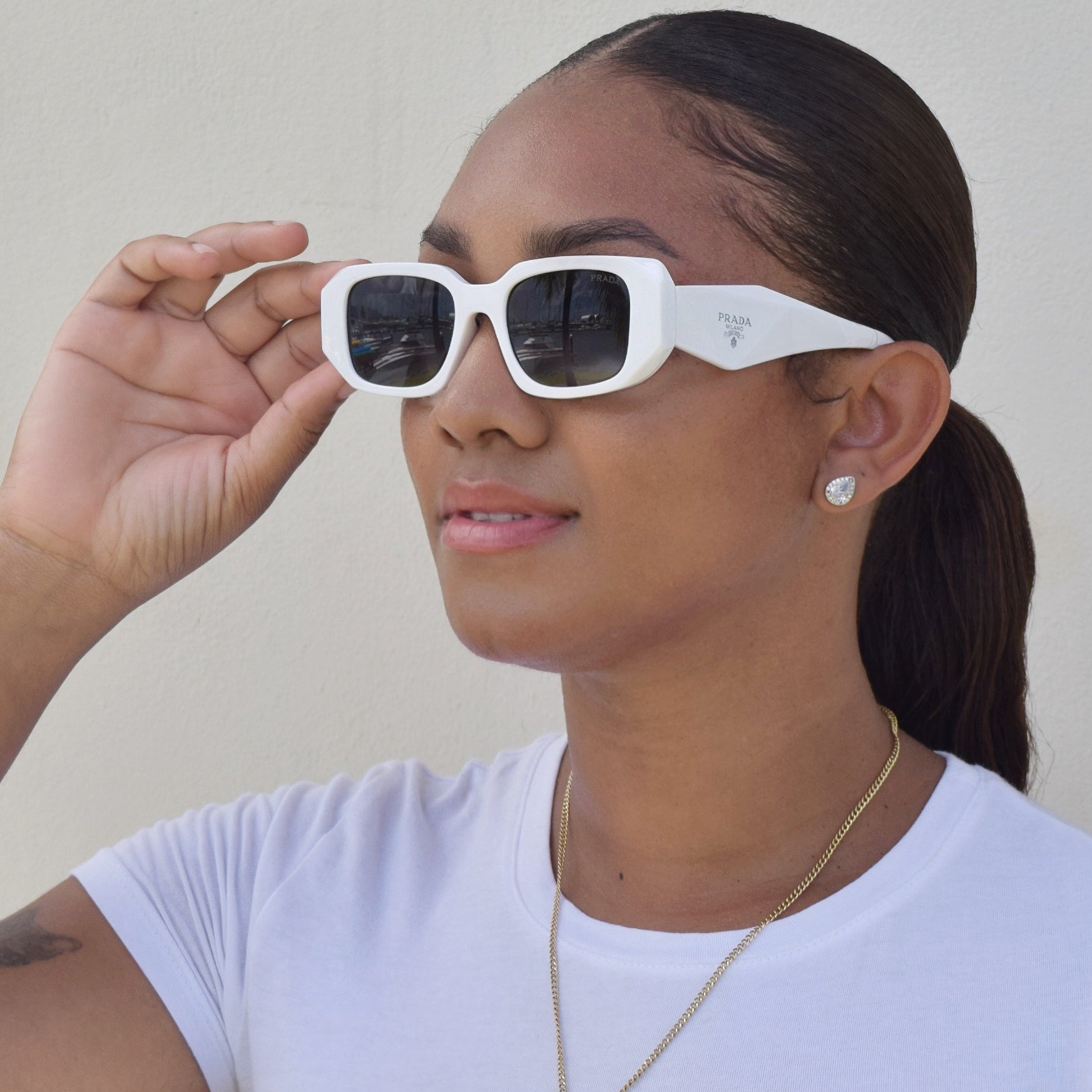 Geometric Rectangular Sunglasses with Thick Frames, Wide Temples, and Tinted Lenses