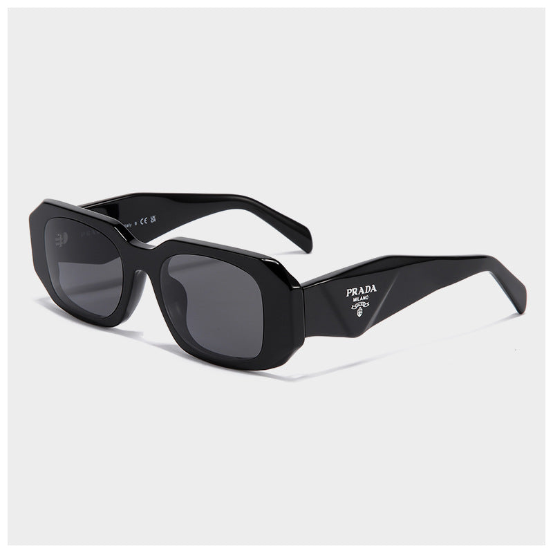 Black square frame Prada sunglasses with dark lenses and white logo on temple for UV400 protection and driving.