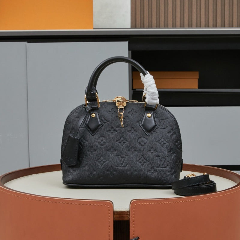 Noble Curve Satchel With Chain Handle