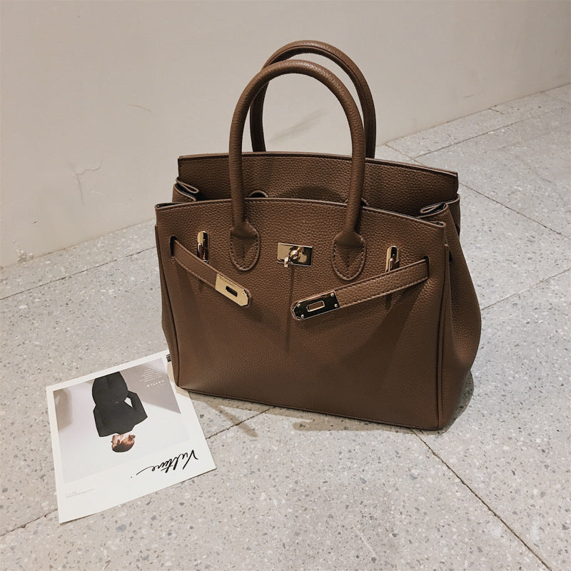 Structured Top-Handle Handbag with Shoulder Strap and Front Buckle Detail