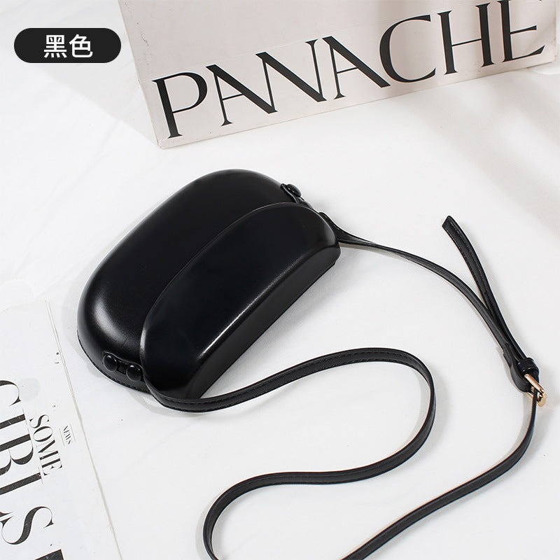 Curved Saddle Crossbody Bag with Flap Closure