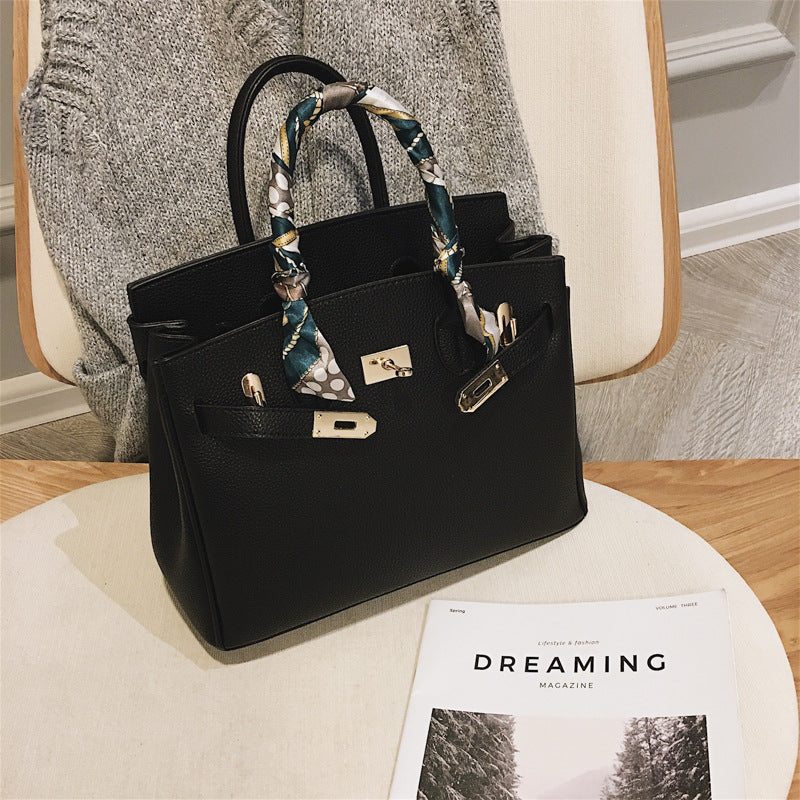 Structured Top-Handle Handbag with Shoulder Strap and Front Buckle Detail