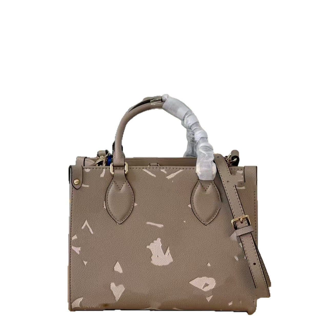 Elite Leather Shoulder Tote with white abstract print and protective handle covering