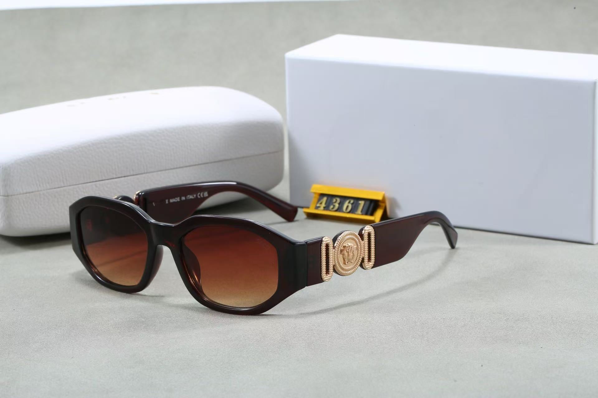Brown box frame sunglasses with gold temple emblem, UV protection lenses, and comfortable fit.