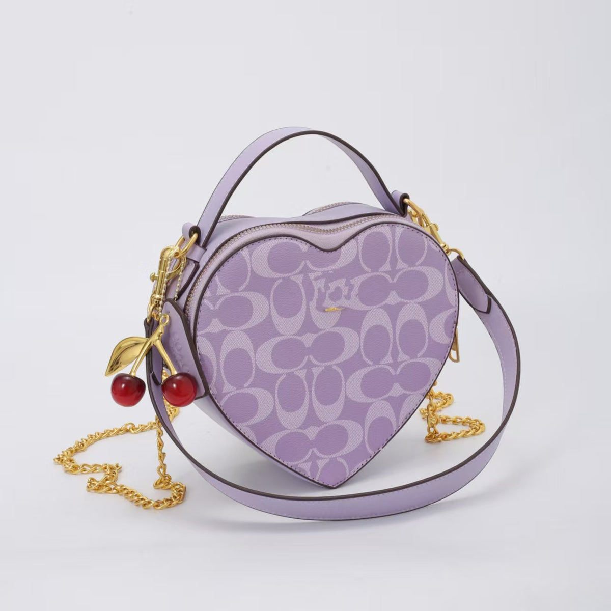 Heart-Shaped Patterned Crossbody Bag with Top Handle, Chain Strap, and Cherry Charm