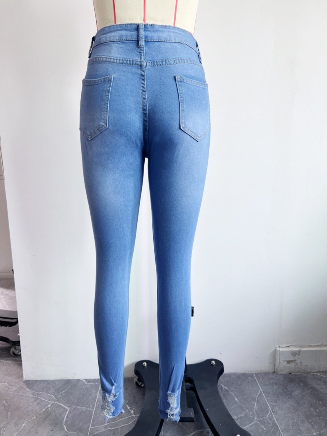 Women's High Rise Skinny Jeans with Distressed Ripped Knees and Frayed Hems