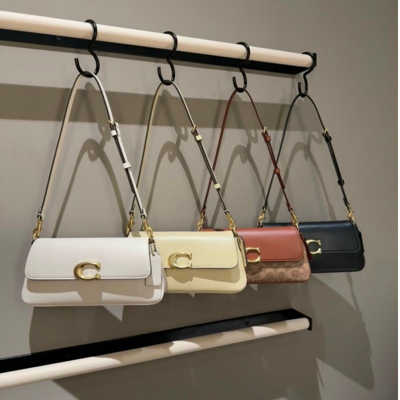 Compact Baguette Crossbody Bag with Adjustable Strap and Flap Closure