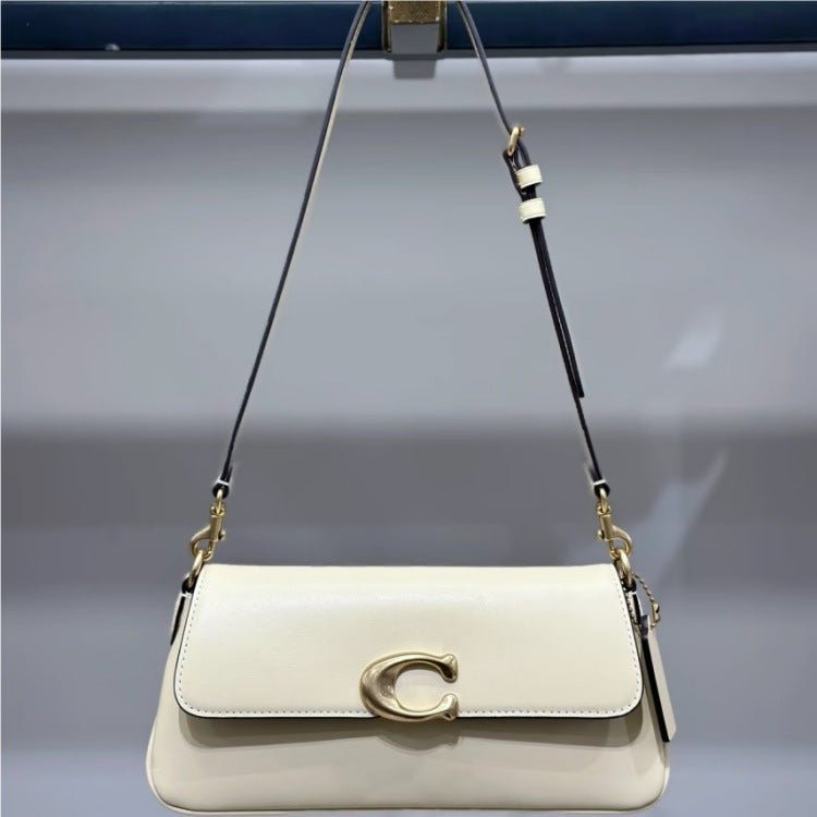 Compact Baguette Crossbody Bag with Adjustable Strap and Flap Closure