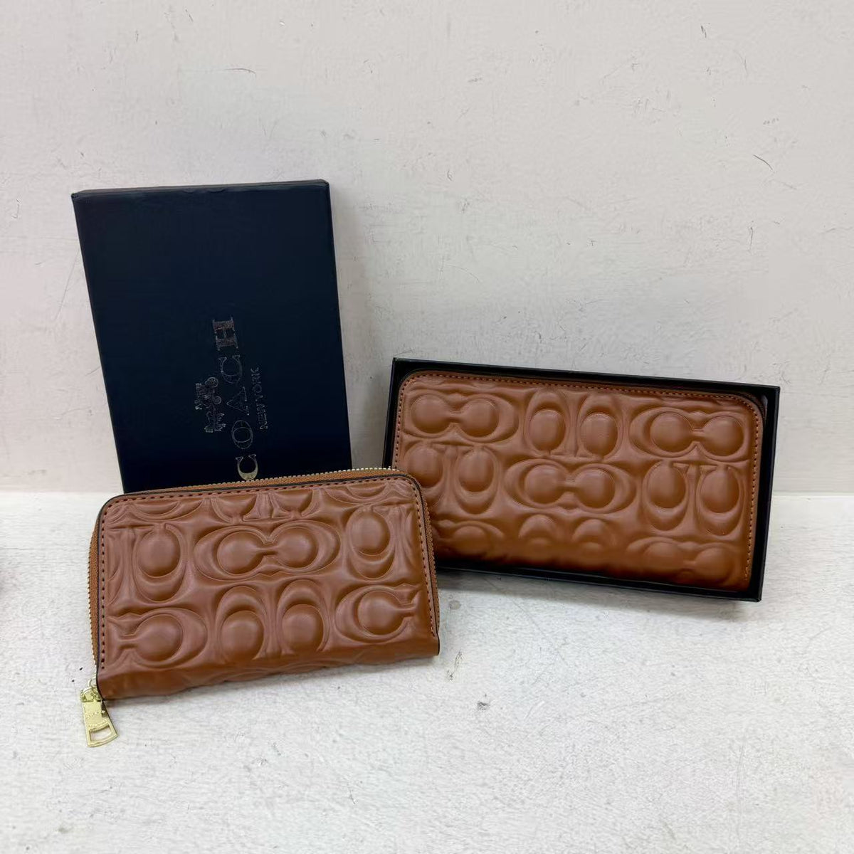 Long Embossed Zip Wallet with Clutch Design