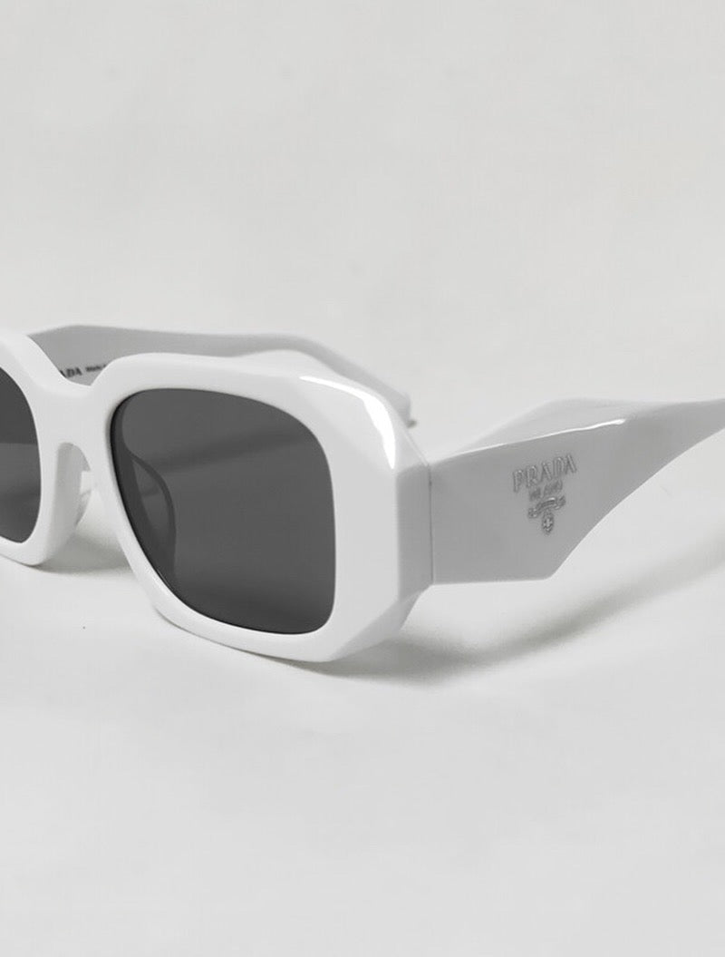 Geometric Rectangular Sunglasses with Thick Frames, Wide Temples, and Tinted Lenses