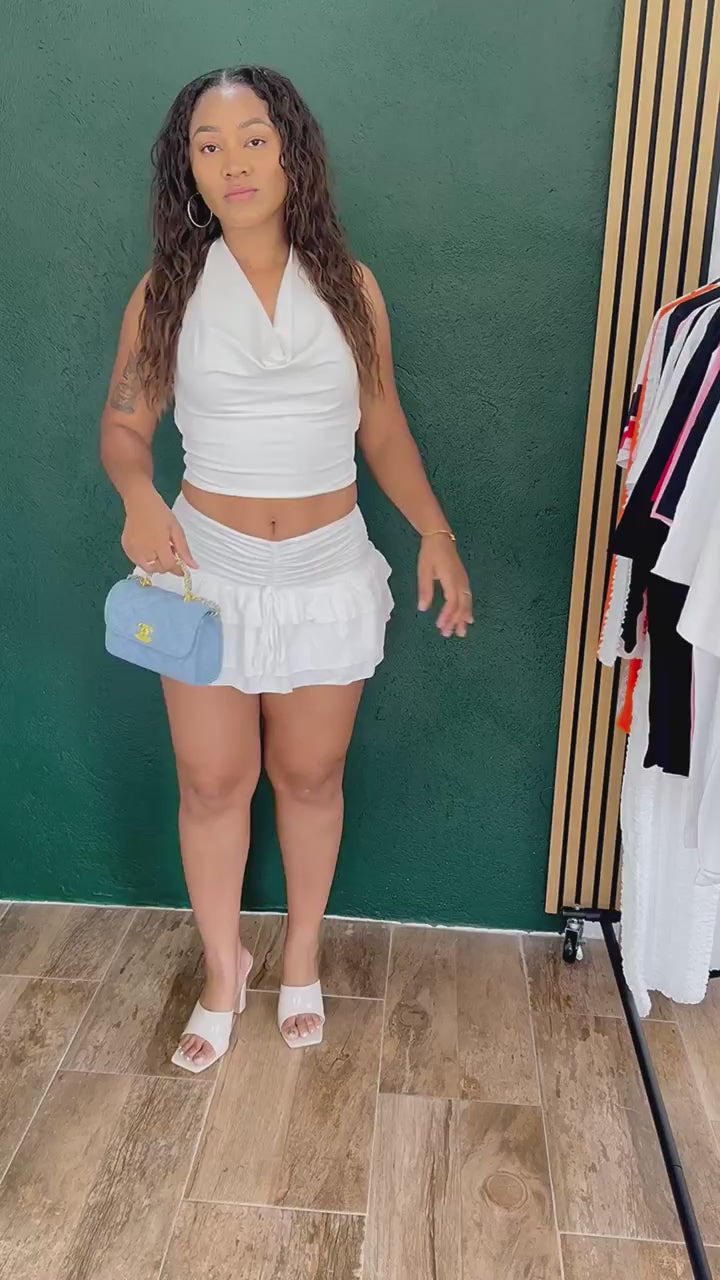 Load video: Women's Draped Cowl Neck Halter Crop Top and Tiered Ruffle Mini Skirt Set